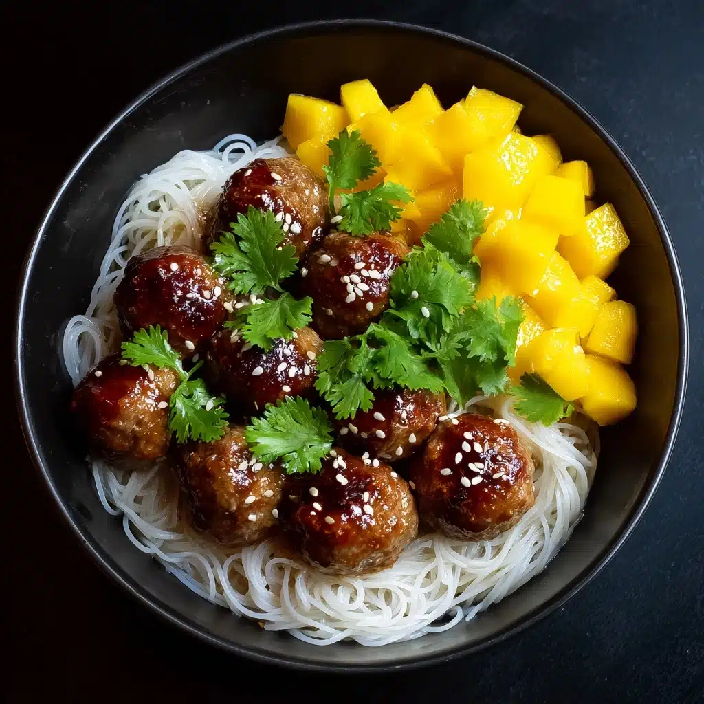 Spicy Asian Chicken Meatballs with Rice Noodles and Mango Recipe - Recipe Image