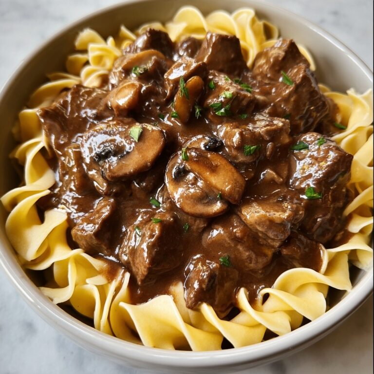 Tender Crockpot Beef Tips with Noodles Recipe